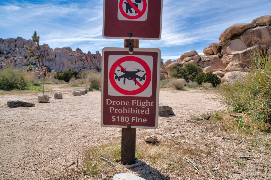 National Park Sign Showing Fine For Breaking Rules